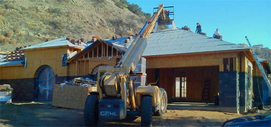 Cherry Picker over New Home