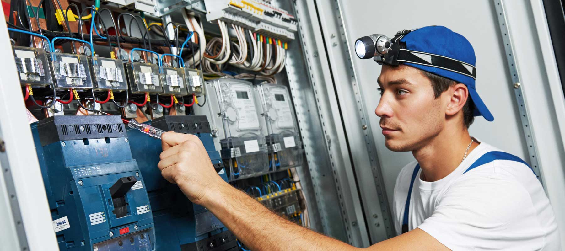 Man Working on Electrical Panel